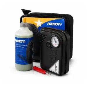 Kit repara pinchazos de emergencia para coche, compuesto por un mini compresor de aire con manómetro, una botella de líquido sellador, herramienta para válvula y estuche negro.
